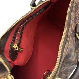 Sac ä main Louis Vuitton